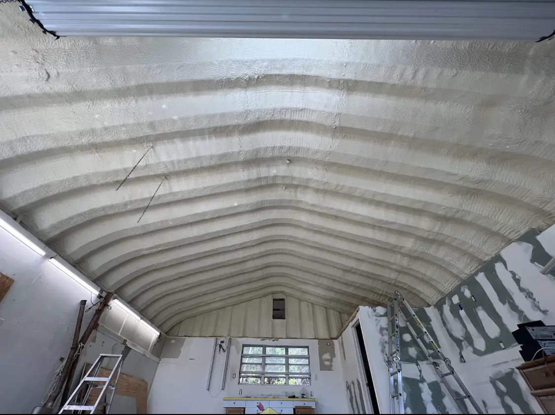 Spray polyurethane foam applied to the underside of a metal roof deck in Bucksport